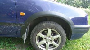 Parafanghini per Toyota Corolla VIII berlina/liftback (1997-2002)
