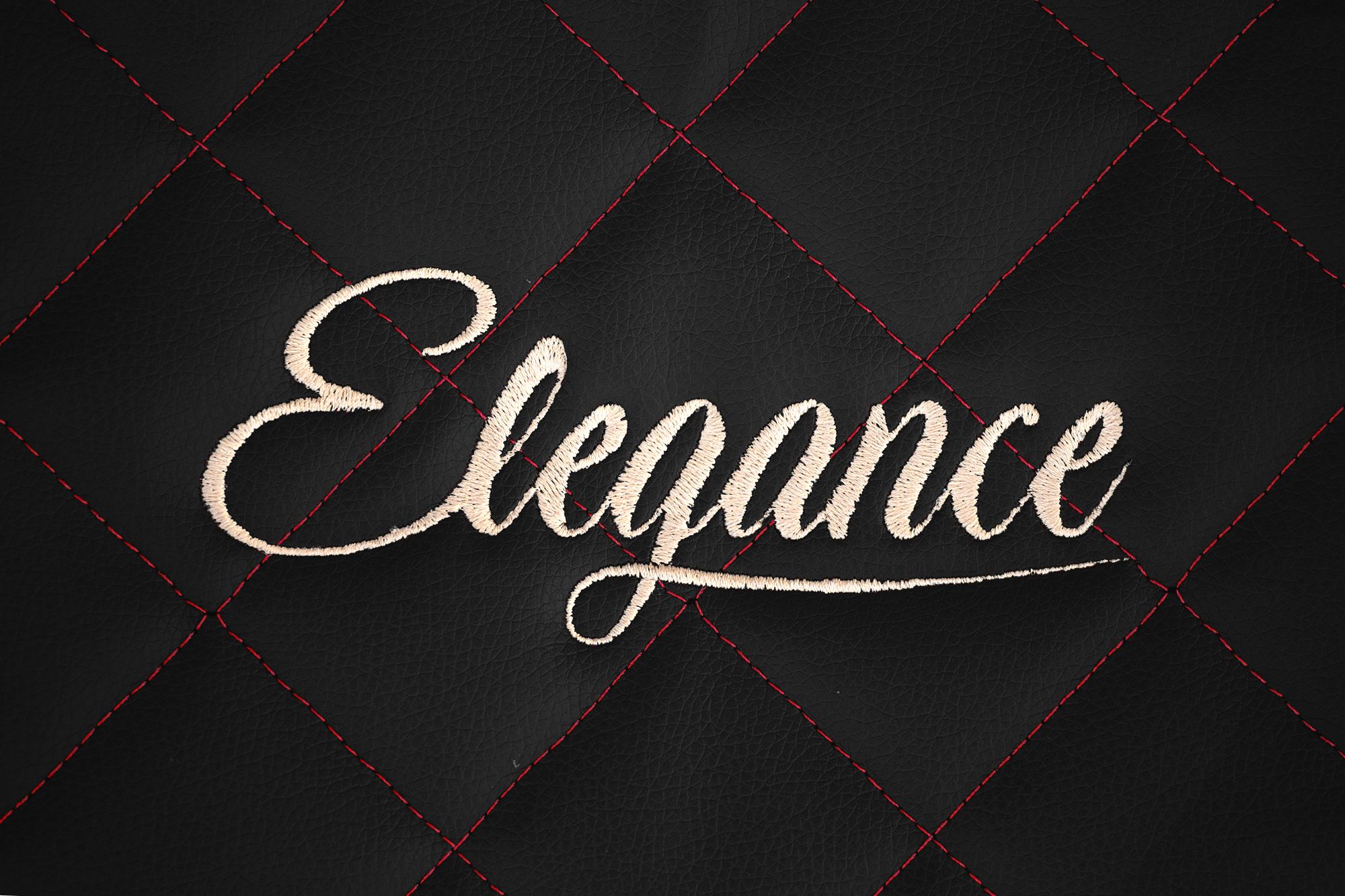Dettaglio del ricamo Elegance: Nero e rosso